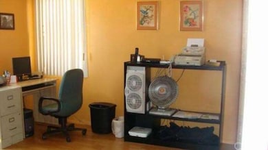 ONE OF THE BEDROOMS