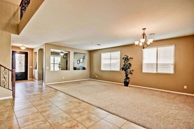 View into open office & front entry!