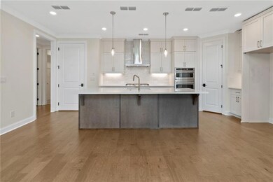 Kitchen with plenty of cabinets - not photo of another Lawrence plan previously built in the community.