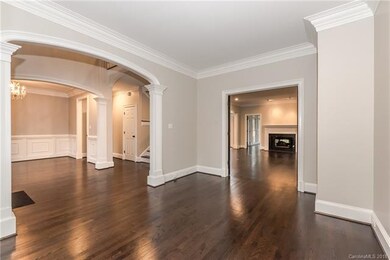 View from living room/study into foyer, dining roo