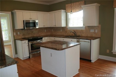 Kitchen island provides additional space for doing
