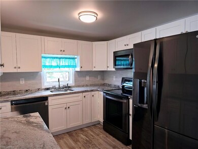 Electric range, microwave, dishwasher and refriger