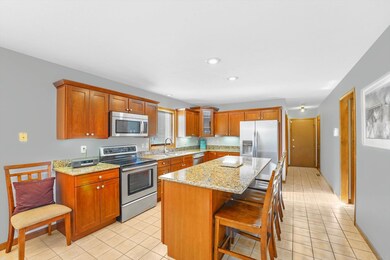 The center for all activity, this kitchen has plen