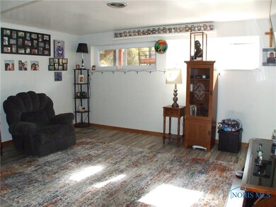Family room with LVP flooring.