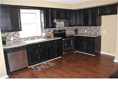 Kitchen with stainless appliances.