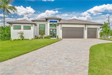 Contemporary house with a garage and a front yard