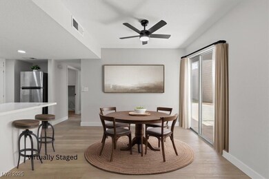 Dining room featuring visible vents, baseboards, r