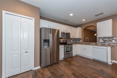 Kitchen with New Stainless Appliances