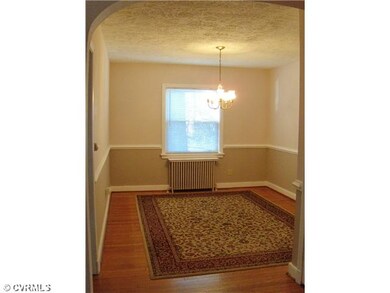 Dining Room - Dining room with chandelier and chai