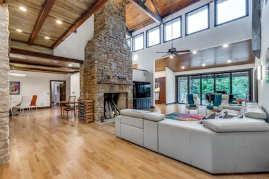 Living area with a wood ceiling with exposed beam