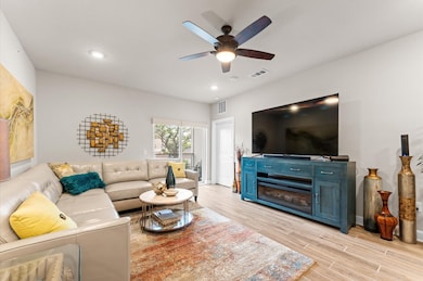 Spacious open-concept living area with abundant na