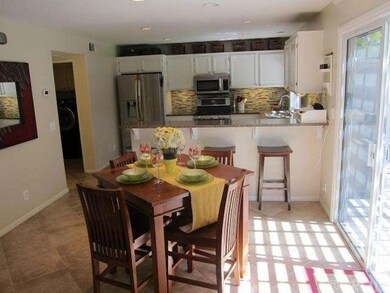 Dining area, open to kitchen and family room, Laun