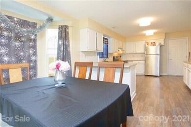 breakfast nook open to kitchen