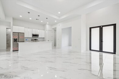 Kitchen featuring pendant lighting, a kitchen isla