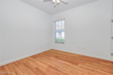 Unfurnished room with ceiling fan and light wood-t
