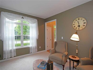 Living Room. We are calling this the formal living room, but it could be used any number of ways....office, den, library or music room?  Sellers have used warm, rich neutral colors throughout home.  Buyers can simply bring the groceries and move righ