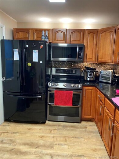 1701 NE 191st St unit A105, Miami, FL 33179 - photo 7