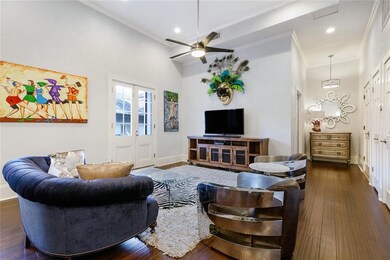 View of the foyer and living area. Wood flooring, 