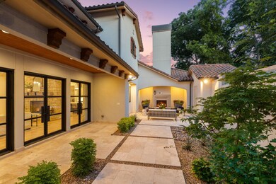 Front courtyard provides charm and visual protecti