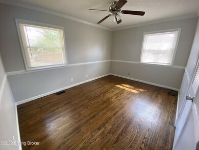 Primary Bedroom with two windows