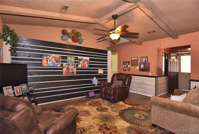 Vaulted ceiling and interesting wall treatment.  N