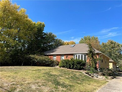 504 W Lucy Webb Rd, Raymore, MO 64083 - photo 2