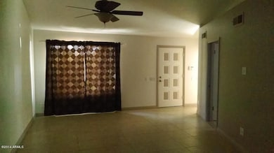 VIEW OF LIVING ROOM FROM OTHER SIDE