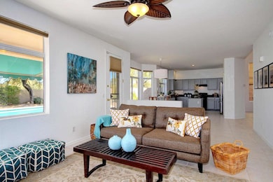 Living area and kitchen open and bright!