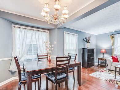 Dining room, gleaming hardwood floor, large window