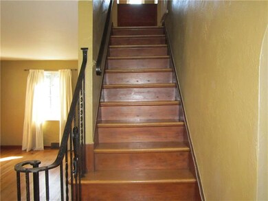 Stairs leading to upstairs 3 bedrooms and updated 