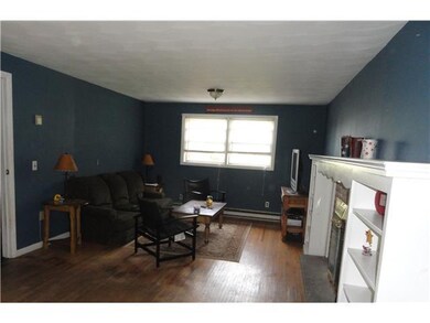 Family Room Family Room in Basement with Woodburni