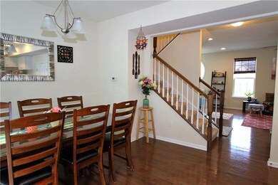 The dining area is open to the kitchen and outdoor