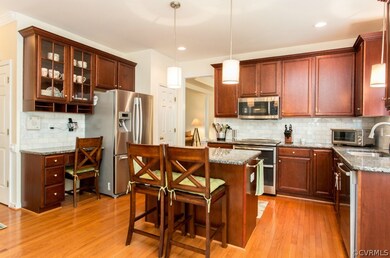 Granite countertops, tile backsplash, double oven