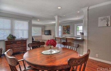 View of kitchen and living room from corner of din