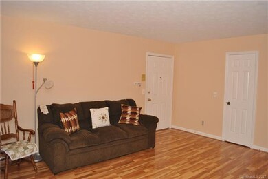 Living Room, Laminate flooring. Doot to hallway