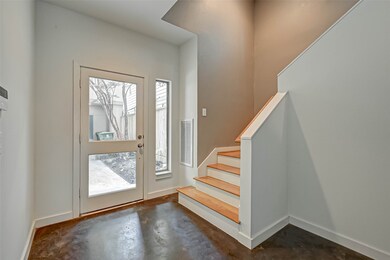  Two car garage is equipped with overhead bulk and