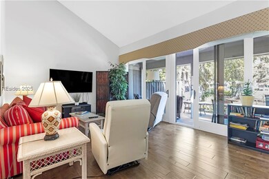 Den Area Overlooking The Patio And Lagoon