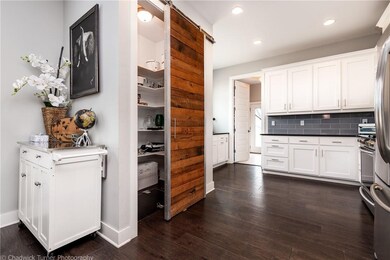Reclaimed wood from the original 1934 home bring w