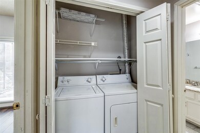 Washroom featuring independent washer and dryer, p