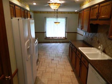 New tile floor, counter tops, back splach and ligh