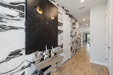 Beautifully tiled entryway wall