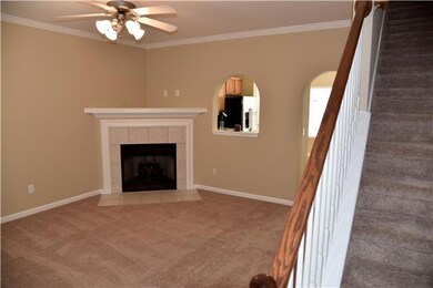 Tile entry foyer.  Rounded archway to kitchen.  