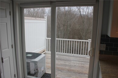 Deck view from kitchen with sliding door
