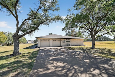 Side-entry garage with plenty of driveway parking. Looking for elbow room? This property has it!
