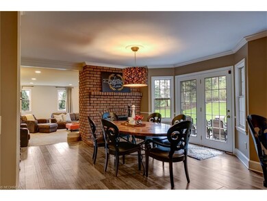 Custom lighting and a double sided gas fireplace a