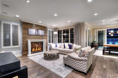 Family room features beautiful hardwood floors tha