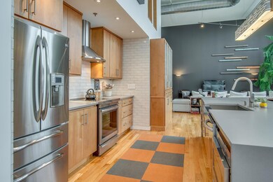Stainless steel farmhouse sink, induction cooktop and convection oven. Gas line is already installed behind oven if that's your preference.