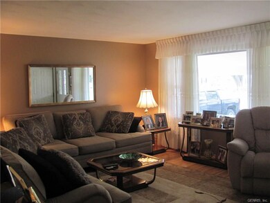 Living room features hardwood floors