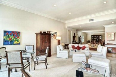 The high ceilings, recessed lighting, and crown mo