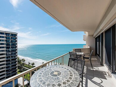 Balcony featuring a water view and outdoor dining space